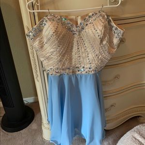 Short sequenced blue and cream silver dress.